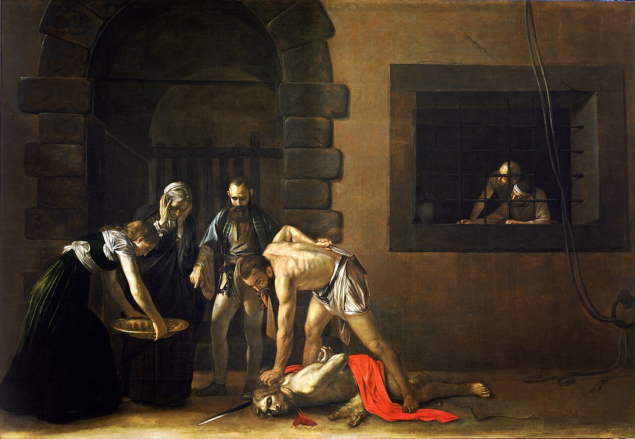 El martirio de san Juan Bautista representado por Caravaggio en la prisión de Herodes